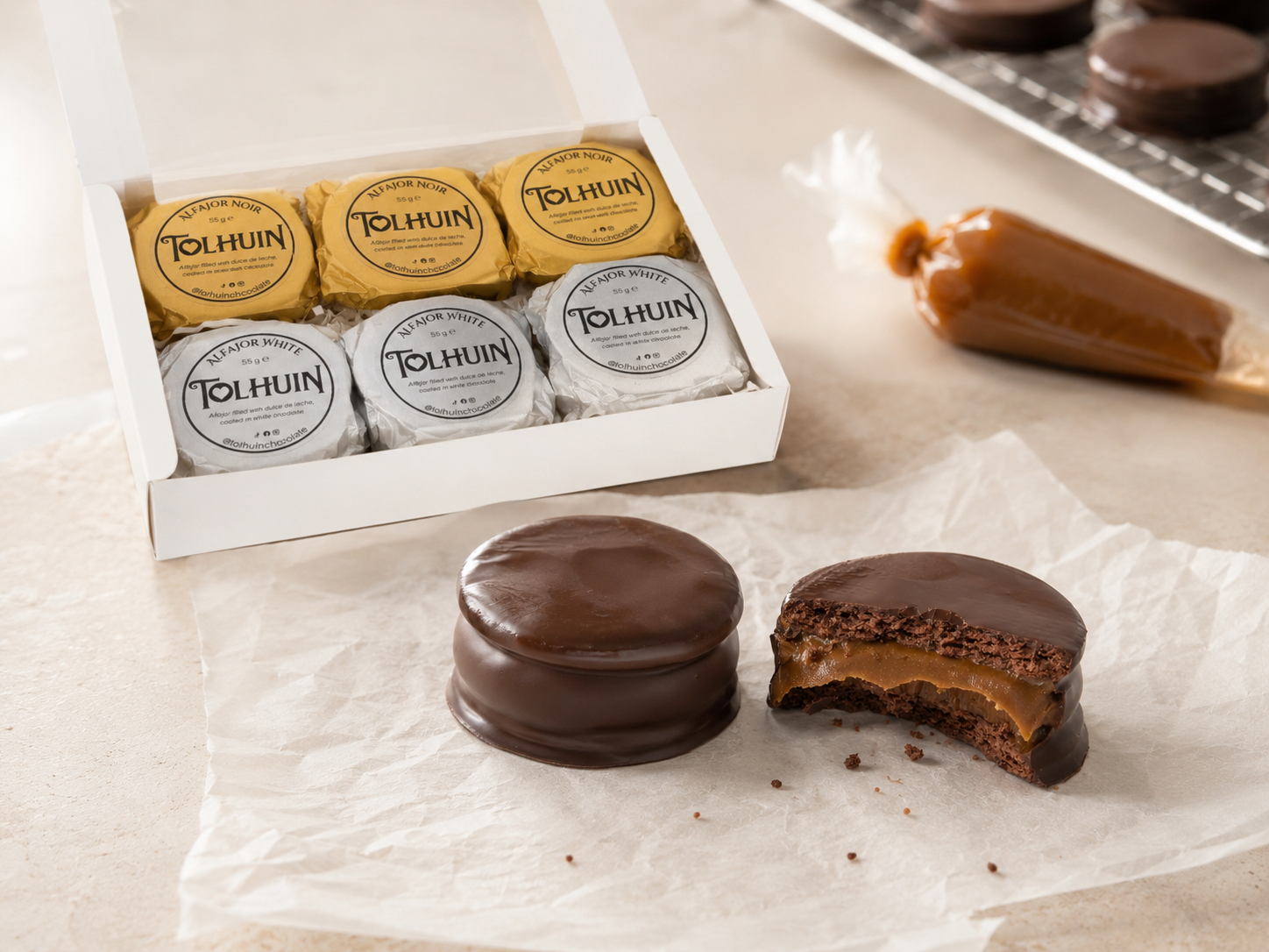 Tolhuin alfajores with dulce de leche and an open box